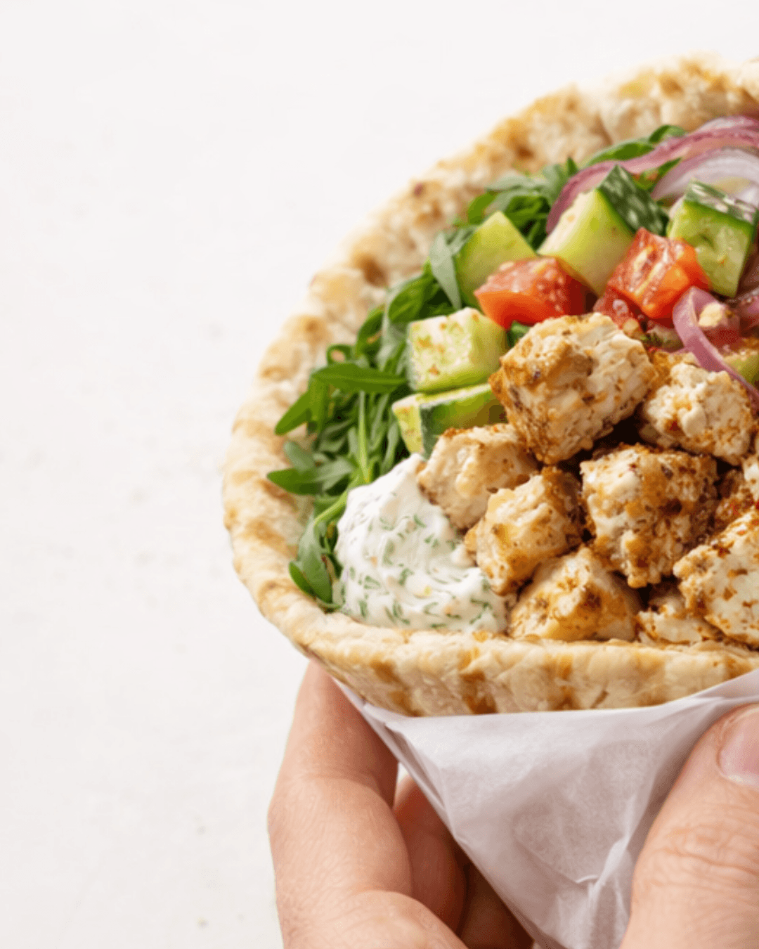 Freshly sliced vegetables for Mediterranean bowls